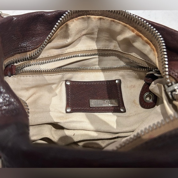 Beautiful vintage brown leather MIU MIU bag. Long brown strap. Zipper closure - Picture 14 of 14